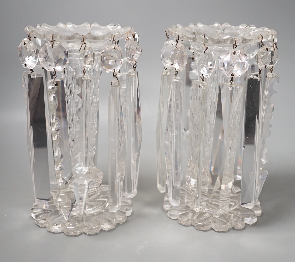 A pair of Victorian clear glass table lustres - 23cm high